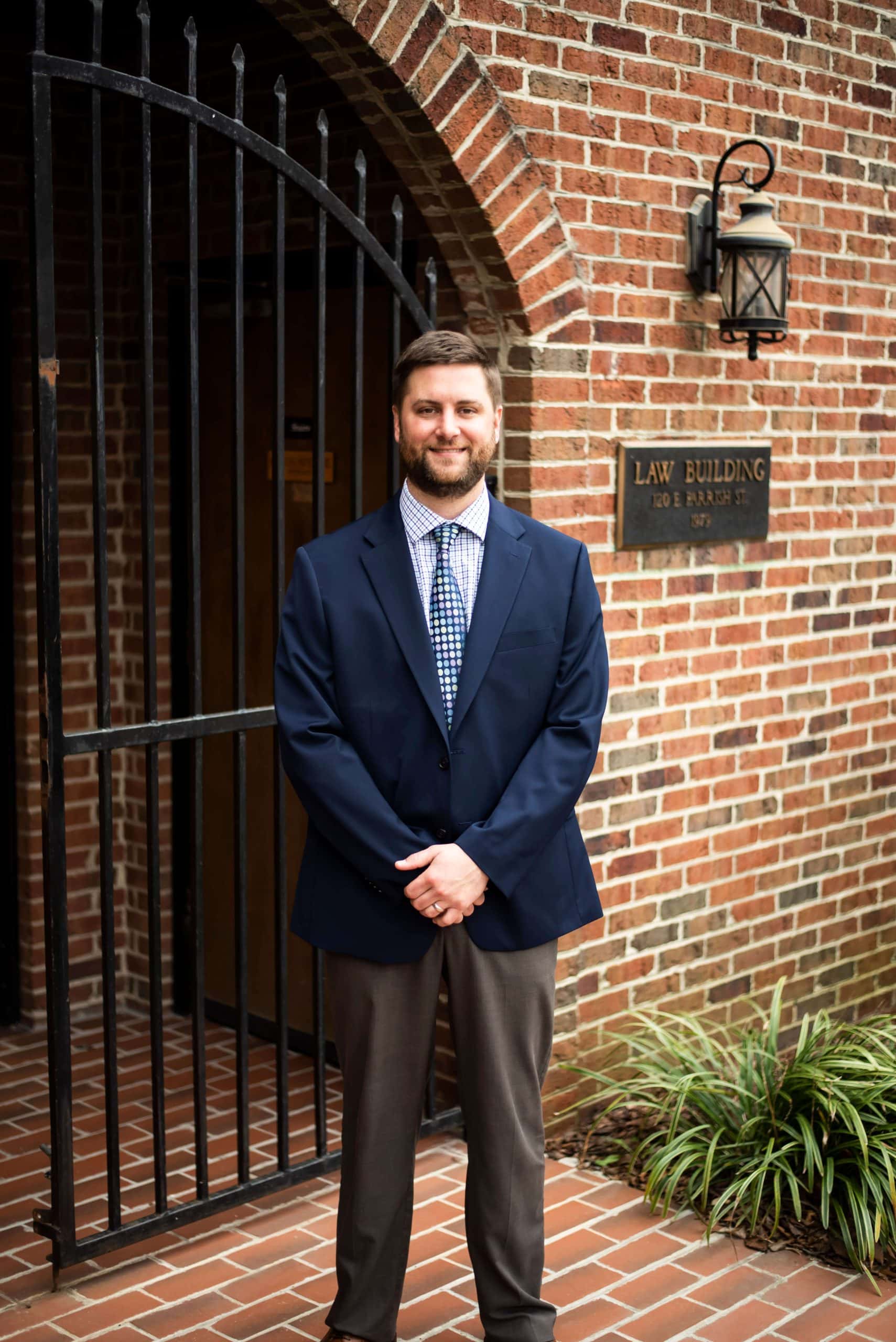 An injured client discusses car accident claim appeal options with Constantinou & Burkert Accident Injury Lawyers in Durham North Carolina